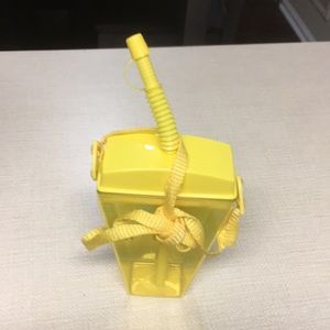 Yellow portable tumbler with straw
